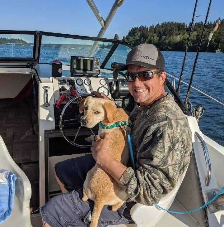 Bill Hayes on Puget Sound with his dog